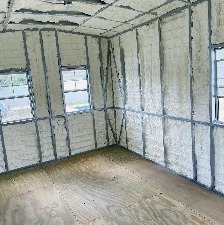 Closed-cell spray foam insulation applied to wall cavities in a residential project in Gypsum